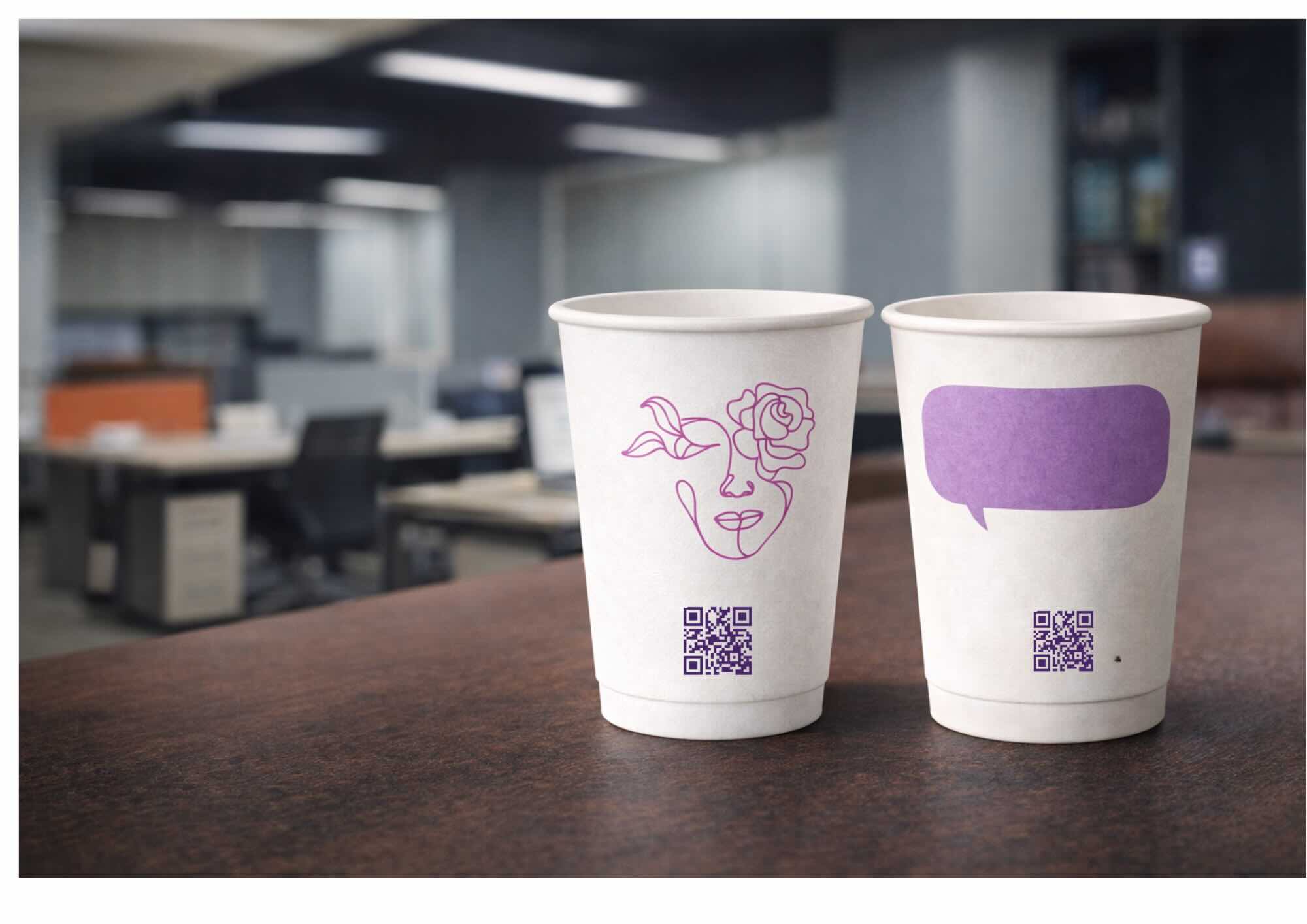 Paper cups with advertisements in an office setting